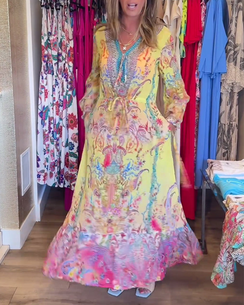 Vestido largo estampado de manga larga con lazada