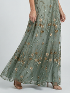 Selora vestido midi floral con cuello halter en verde salvia - vista lateral