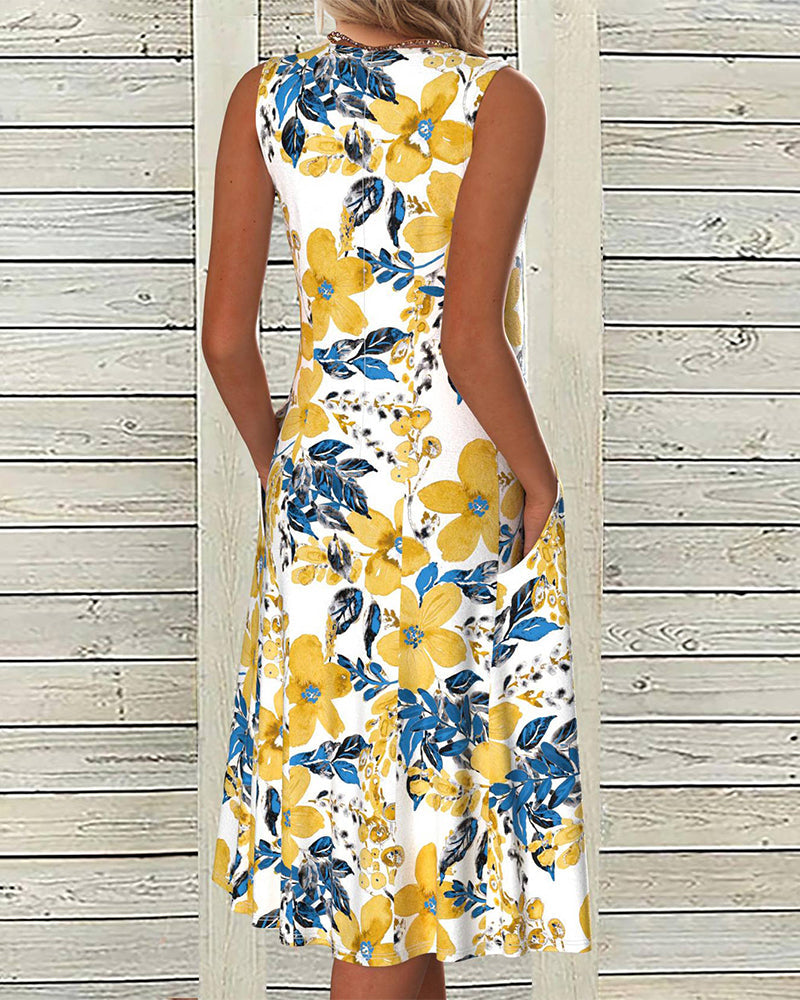 Vestido midi floral sin mangas con bolsillo