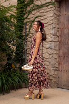 Capri vestido largo estampado verde con volantes y cuello halter