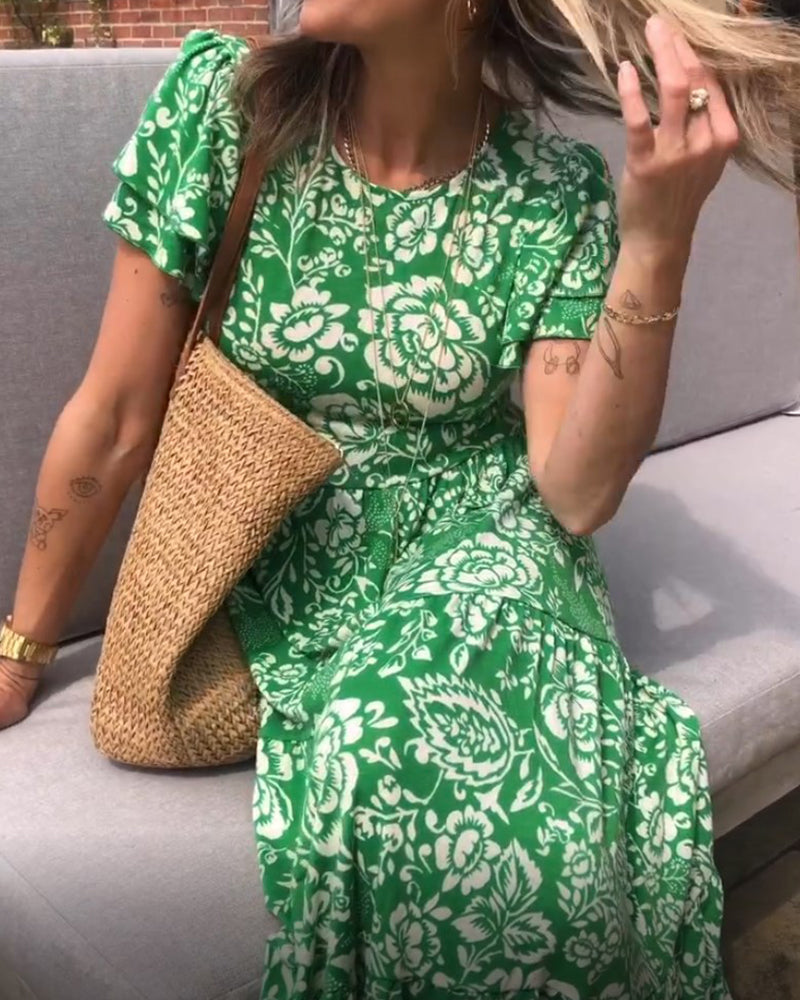 Vestido midi estampado con mangas de volante