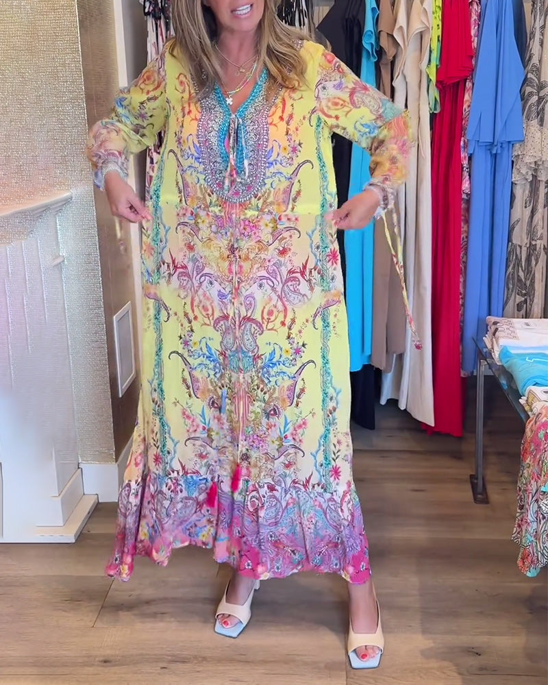 Vestido largo estampado de manga larga con lazada