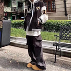 Derek™ | Chaqueta varsity oversize con parches bordados