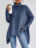 Aria™ | Jersey de cuello alto oversize con bajo asimétrico