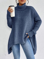 Aria™ | Jersey de cuello alto oversize con bajo asimétrico