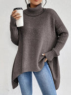 Aria™ | Jersey de cuello alto oversize con bajo asimétrico