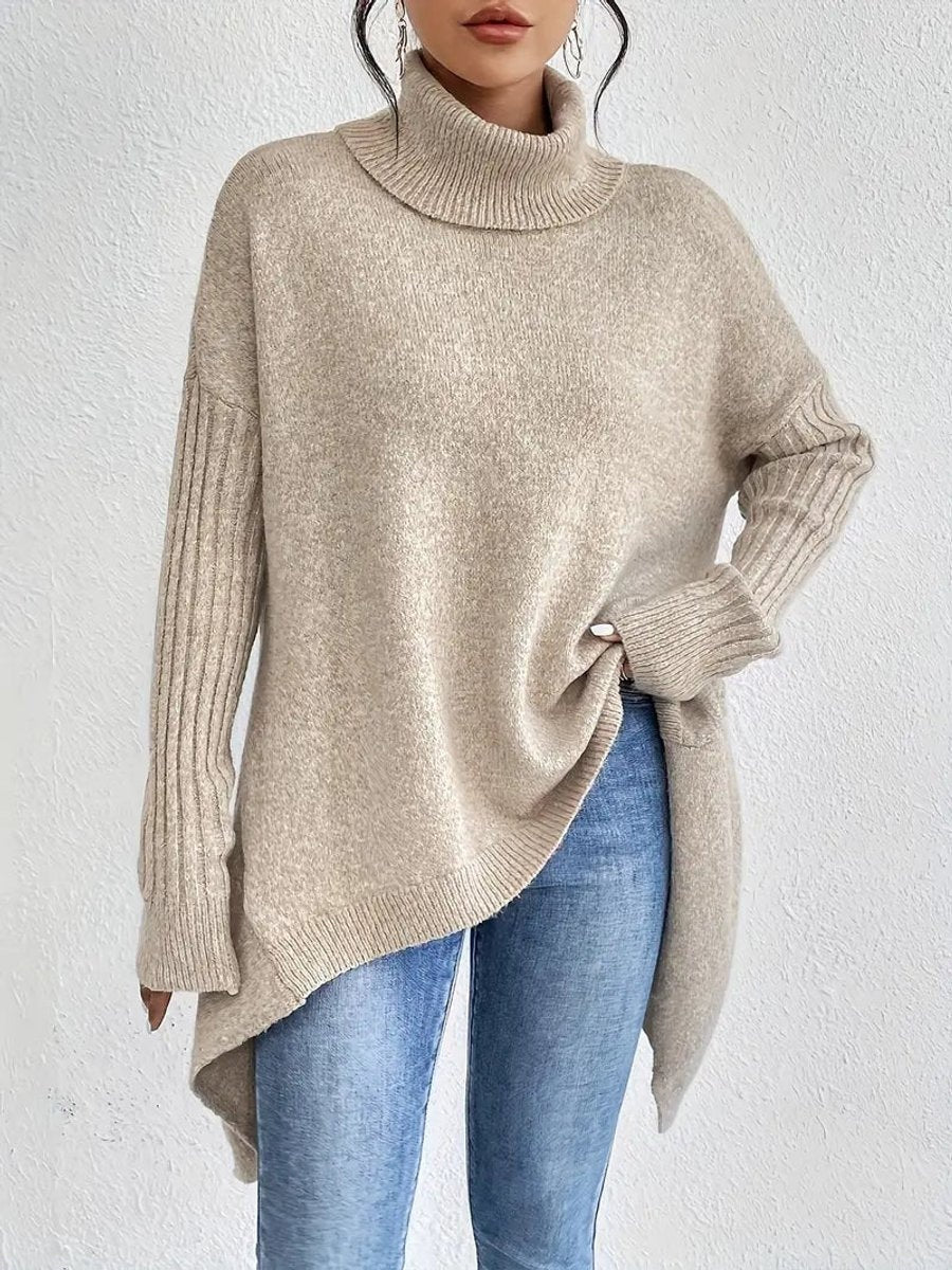 Aria™ | Jersey de cuello alto oversize con bajo asimétrico
