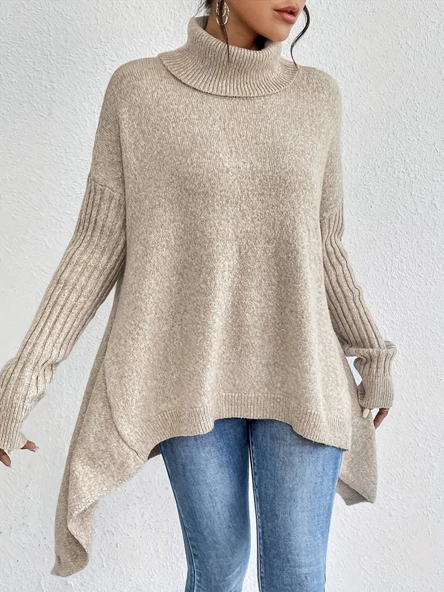 Aria™ | Jersey de cuello alto oversize con bajo asimétrico
