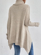 Aria™ | Jersey de cuello alto oversize con bajo asimétrico