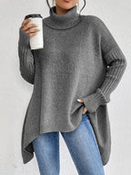 Emily™ | Jersey de punto oversize con cuello alto asimétrico