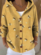 Aurora™ | Chaqueta larga estampada con capucha y botones