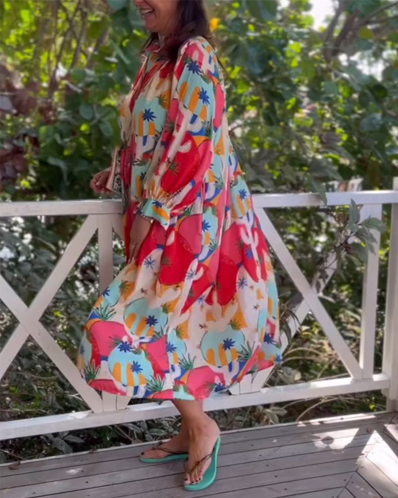 Vestido midi estampado de manga larga con solapa