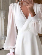 Eden™ | Vestido midi de manga larga abullonada con escote en V