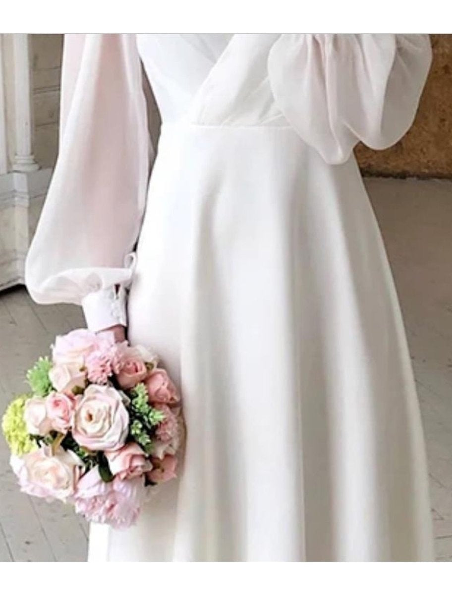 Eden™ | Vestido midi de manga larga abullonada con escote en V