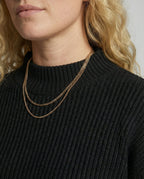 Claire™ | Conjunto de punto: jersey de cuello alto y falda midi