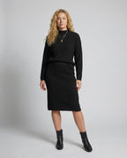 Claire™ | Conjunto de punto: jersey de cuello alto y falda midi