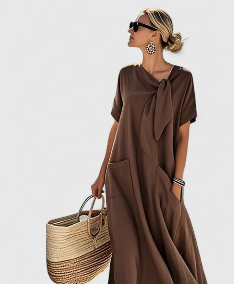 Morgan™ | Vestido largo suelto con lazo al cuello y bolsillos