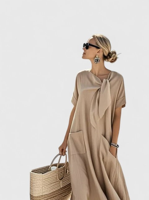 Morgan™ | Vestido largo suelto con lazo al cuello y bolsillos