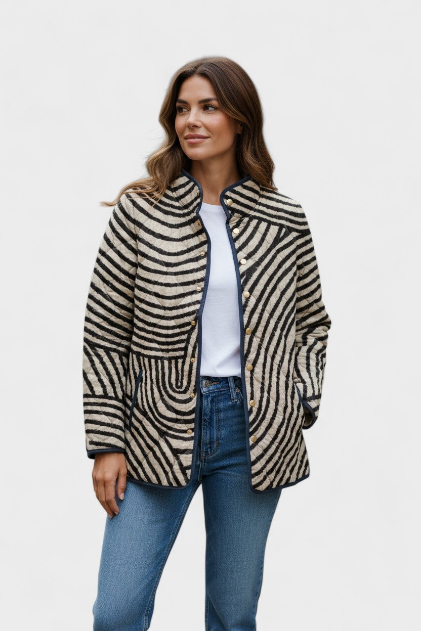 Olivia™ | Chaqueta acolchada de entretiempo con patchwork floral