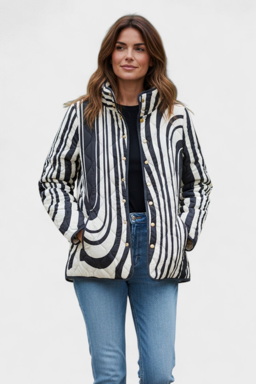 Olivia™ | Chaqueta acolchada de entretiempo con patchwork floral