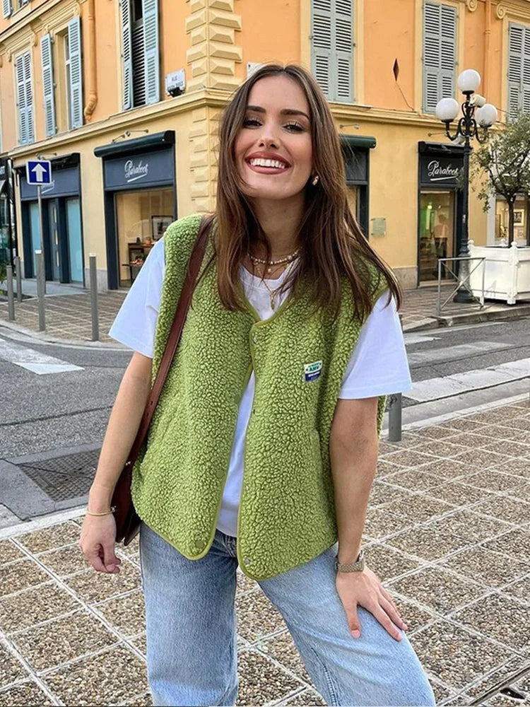 Angela™ | Chaleco sherpa sin mangas con cuello de pico