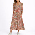 Charlotte™ | Vestido midi de invitada floral con manga tres cuartos