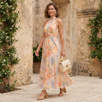 Elena™ | Vestido largo de invitada estampado con cuello halter