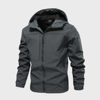 Caleb™ | Anorak softshell con capucha y bolsillos con cremallera
