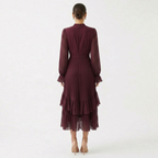 Gabriella™ | Vestido midi plisado con volantes y cuello alto