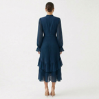 Gabriella™ | Vestido midi plisado con volantes y cuello alto