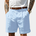 Marcus™ | Bermudas con pinzas y bajo vuelto