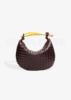 Alejandra - Bolso trenzado con asa dorada