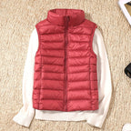 Leah™ | Chaleco de plumas con cuello alto y cremallera