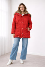 Melody™ | Abrigo acolchado oversize con capucha de pelo sintético